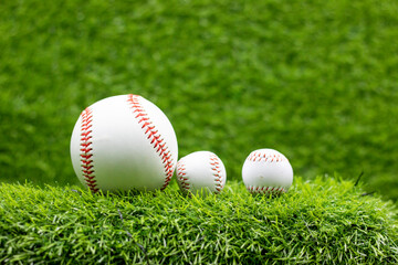 Baseball on green grass 