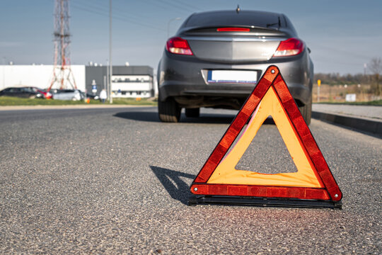 Car accident triangle. Auto vehicle broken down on road. Motor car problem concept. - Powered by Adobe