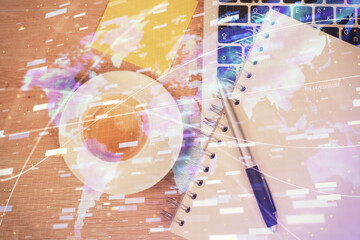 Double exposure of data drawing hologram over topview of study desk background with computer. Concept of Ai.