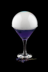 Smoke bubble lavender cocktail on black background. Isolated