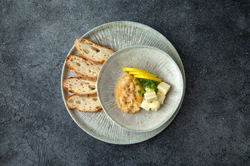 Pike caviar with butter and baguette. Delicious appetizer. Ready menu for the restaurant. Neutral gray blue textured background