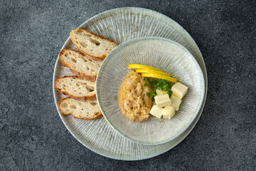 Pike caviar with butter and baguette. Delicious appetizer. Ready menu for the restaurant. Neutral gray blue textured background