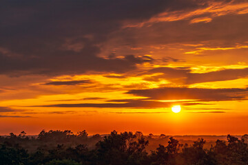 Fototapeta na wymiar Deep orange sunset from the North Carolina coast