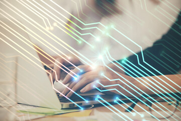Multi exposure of woman hands working on computer and data theme hologram drawing. Tech concept.