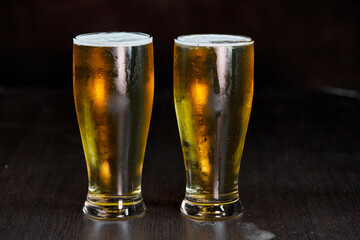 glass of beer isolate on dark background