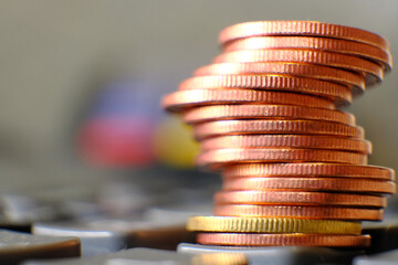 Close up stack of coin on table background and business or finance saving money, Advertising coins...