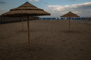 sand beach with umbrellas in Catania in Sicily