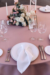 Cutlery on the table. Banquet and wedding table setting. Banquet accessories. Close-up.