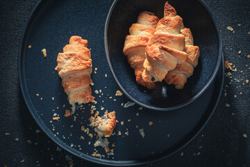 Tasty croissants made of puff pastry. Sweet french dessert.