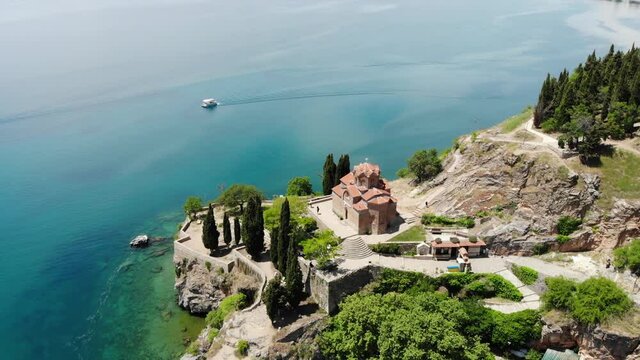 Drone view of the Church of St. John Kaneo in Ohrid. Church of St. John the Evangelist. Drone shot of the Macedonian Orthodox Church, located on a cliff above the Kaneo beach in the city of Ohrid 