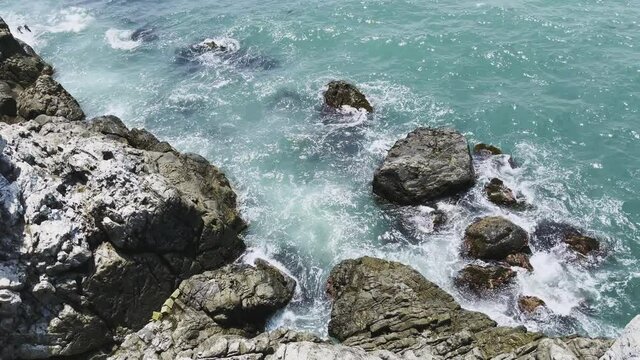 Ocean waves hit the rock,  Nature concept.