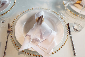 Cutlery on the table. Banquet and wedding table setting. Banquet accessories. Close-up.