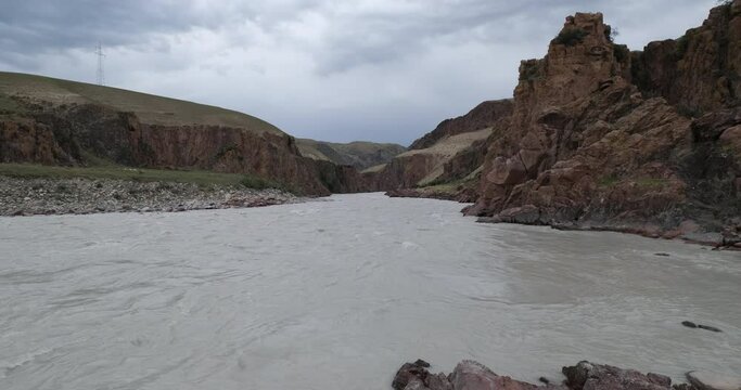 kuokesu valley and Ili river under cloudy sky. Travel destination in Tekes,Ili,Xinjiang,China 