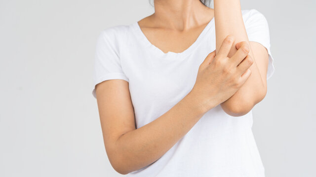 Woman with itchy hands and problems with health and medical concepts