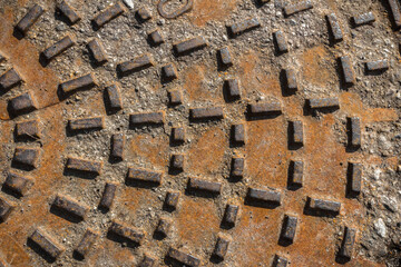 Rusty sewer manhole cover
