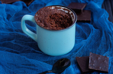 dessert. Mugcake. Quick chocolate cake in a mug. Homemade Chocolate Microwave Mug Brownie Ready to Eat. Fast cooking in the microwave. Copy space. . High quality photo