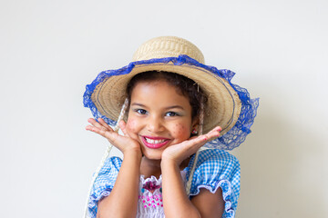 Brazilian kid wearing traditional costume for Junina Party