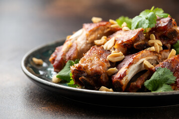 Chinese Pork ribs with peanuts and coriander