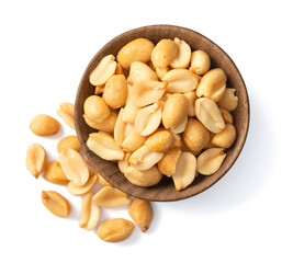 roasted peanuts in the wooden bowl, isolated on white background, top view