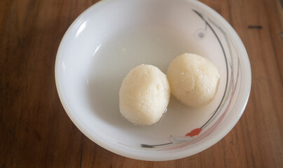 Two Pieces of traditional white bengali sweet locally called Misti. Famous Bangladeshi dessert.