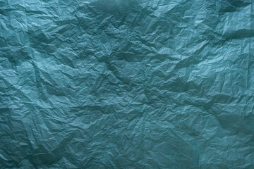 texture of crumpled aqua wrapping paper