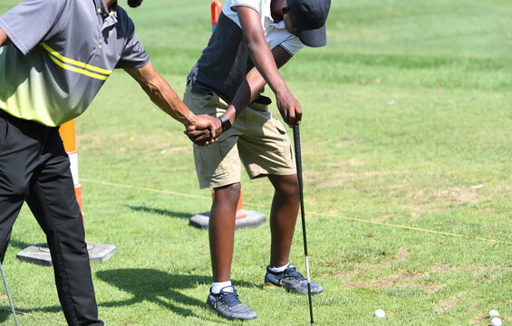 golf instruction to African American