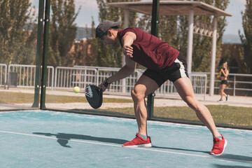 paddle tennis players playing a game