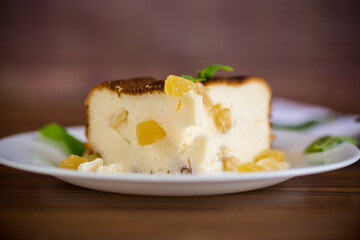 sweet baked cottage cheese casserole with nuts and candied fruits