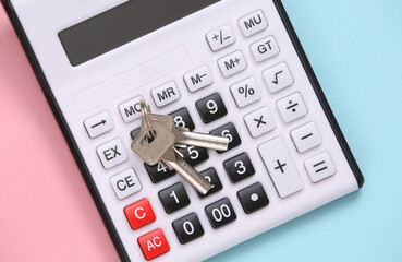 Calculator with keys on blue pink pastel background