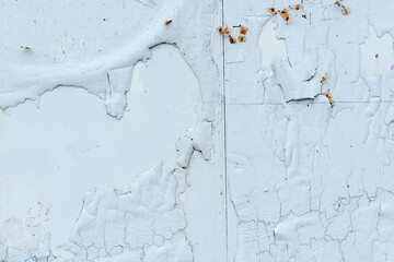 old cracking and peeling paint on a wall