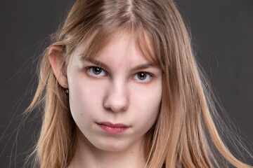 Naklejka premium Close-up of a teenage girl's face.