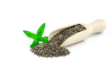 Wooden spoon with seeds and green chia leaves on a white background.