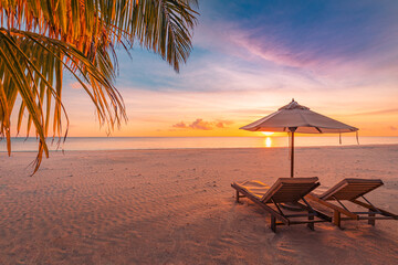 Amazing beach. Chairs on the sandy beach sea. Luxury summer holiday and vacation resort hotel for...