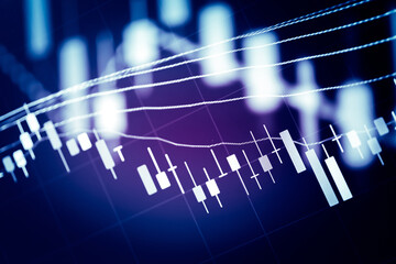 Abstract financial trading graphs and digital number of foreign exchange market trading on monitor. Background of gold and blue digital chart to represent stock market trend.