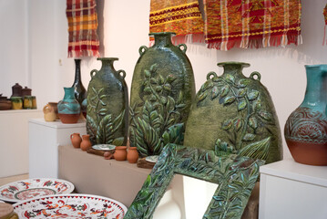 Fototapeta premium Ceramic dishes, tableware and jugs, colorful decorated Russian dishes