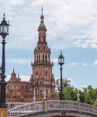 Fototapeta na wymiar View of the south tower of the plaza españa in Seville, a construction made with exposed brick and ceramic