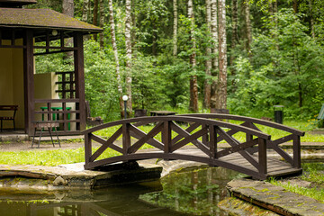 wooden bridge and gazebo