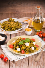 Fusilli pasta with cherry tomatoes and sweet corn.