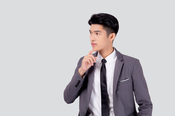 Portrait young asian business man in suit with smart thinking idea isolated on white background, businessman standing and planning for success, handsome manager or executive, emotion and expression.