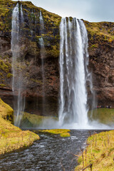 Fototapeta na wymiar Frontal view of the Seljalandsfoss waterfall, Iceland