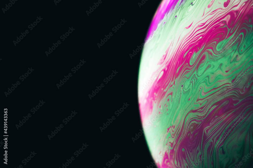 Wall mural bubble macro. abstract galaxy background with globe planet earth in universe space with sunlight on 