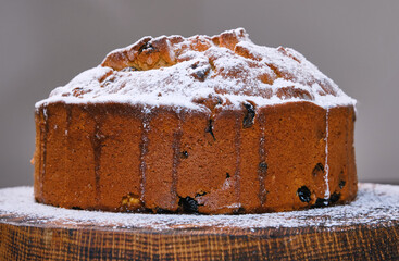 Fresh perfect muffin cake decorated icing sugar on the table. Selective focus