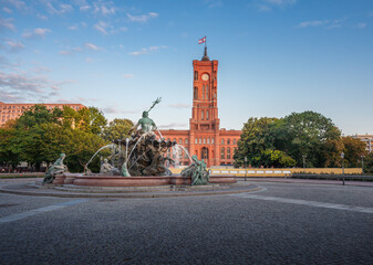 Berlin Town Hall (Rotes Rathaus) and Neptune Fountain (Neptunbrunnen) - Berlin, Germany - obrazy, fototapety, plakaty