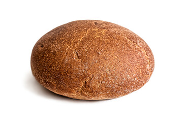 Round loaf of black rye bread with a brown toasted crust