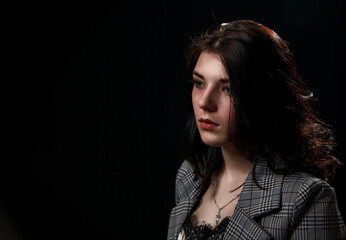 portrait of a young beautiful girl in the studio