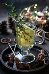 Christmas composition with hot spiced wine with citrus
