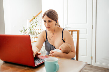 Working from home mother with newborn baby