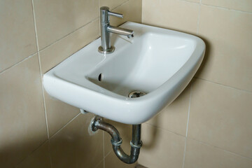 Ceramic sinks mounted to the wall