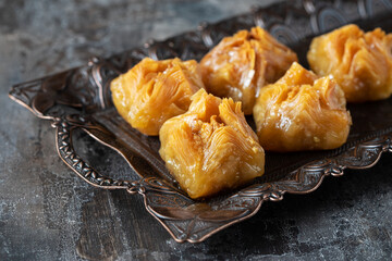 Traditional eastern  dessert Baklava with honey