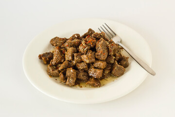 The Sacrifice Festival Food From Turkish Cuisine is braised beef meat,Kavurma on white surface with copy space